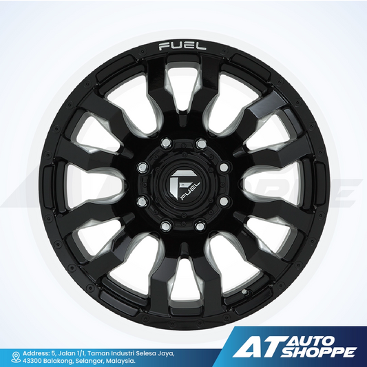 Black alloy wheel with 'Fuel' branding on a white background, featuring AT Auto Shoppe logo.
