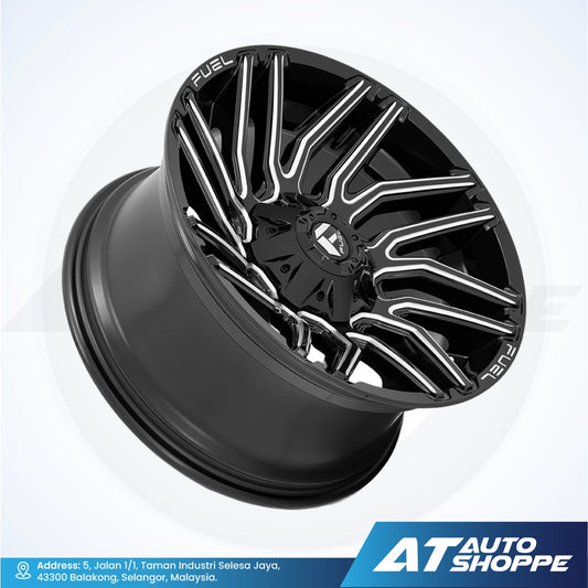 Black alloy wheel with 'Fuel' branding on a white background, featuring AT Auto Shoppe logo.