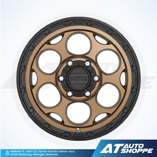 KMC wheel rim on a white background with AT Auto Shoppe branding.