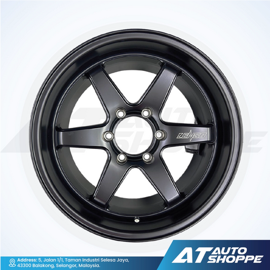Black alloy wheel with 'AT Auto Shoppe' branding on a white background