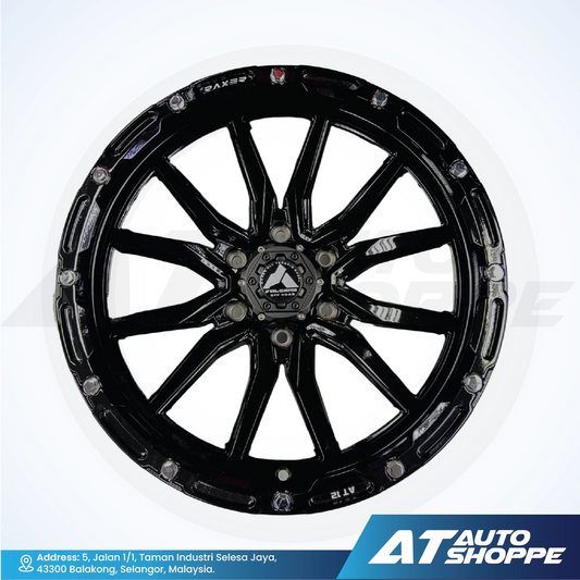 Black alloy wheel on a white background with AT Auto Shoppe branding.