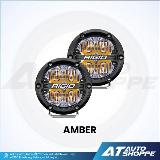 Two Rigid Industries LED lights with 'AMBER' label on a white background, featuring AT Auto Shoppe branding.