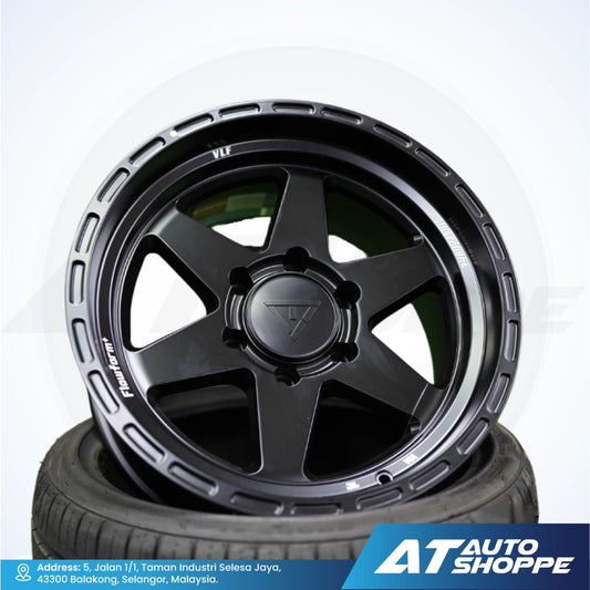 VLF black alloy wheel with tire on a white background, featuring AT Auto Shoppe branding.