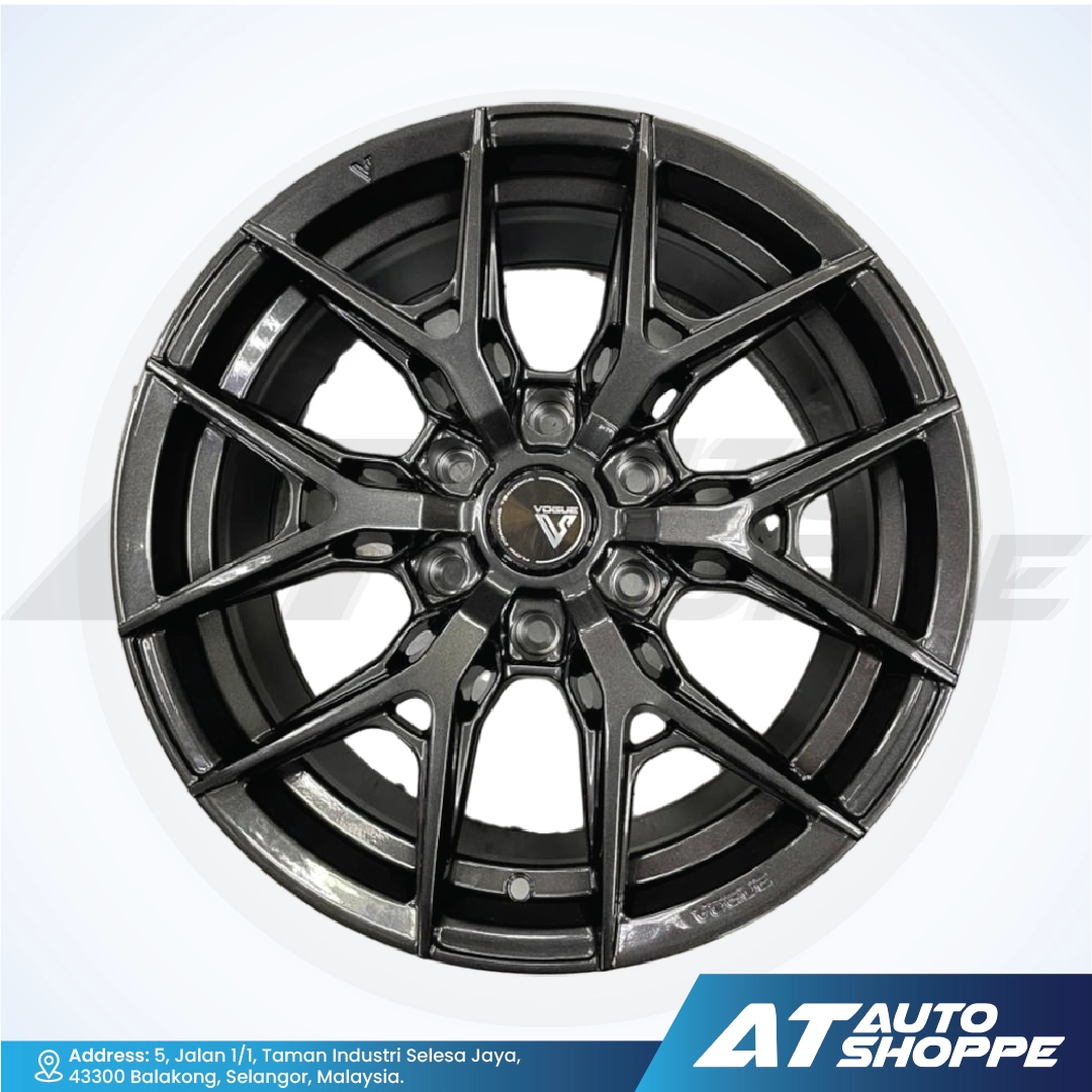 Vogue black alloy wheel on a white background with AT Auto Shoppe branding.