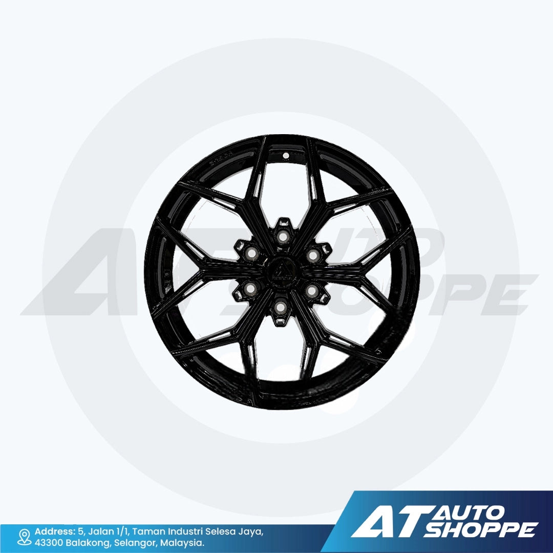 Vogue alloy wheel on a white background with AT Auto Shoppe branding.