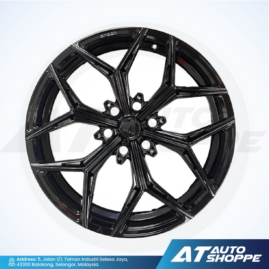 Vogue black alloy wheel on a white background with AT Auto Shoppe branding.