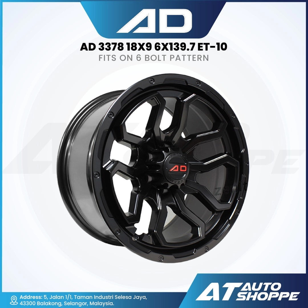Black alloy wheel with 'AD' branding on a white background