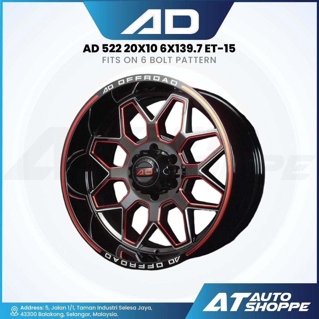 Black off-road wheel with red accents on a white background, featuring 'AD' branding.