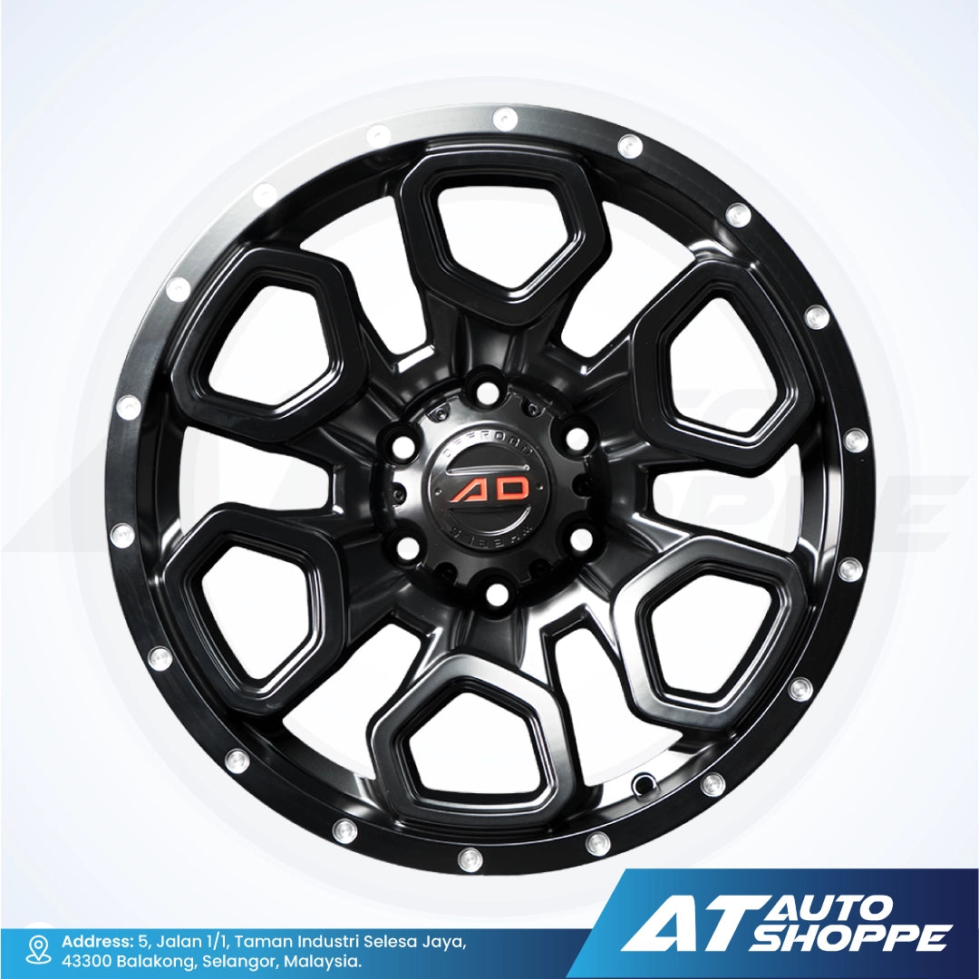 Black alloy wheel with a brand logo on a white background