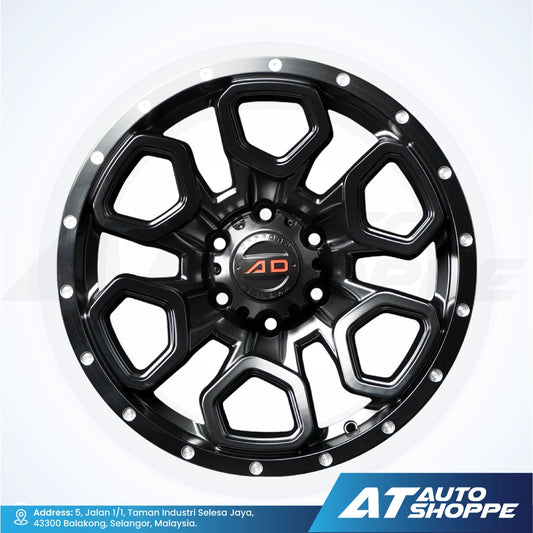 Black alloy wheel with a brand logo on a white background