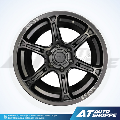 Black alloy wheel with visible branding on a white background