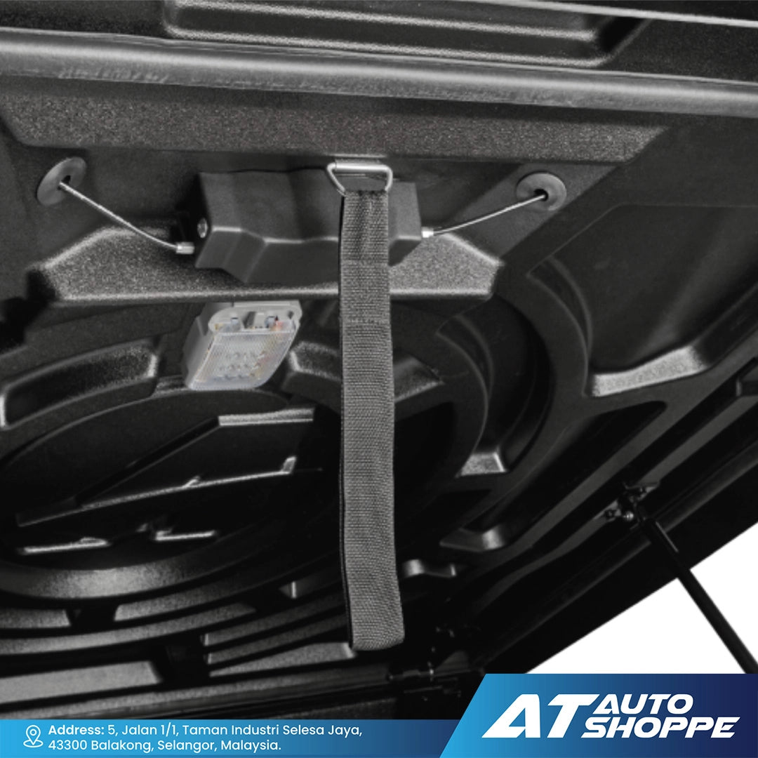 Close-up of a Aeroklas tonneau cover component with 'AT Auto Shoppe' branding.