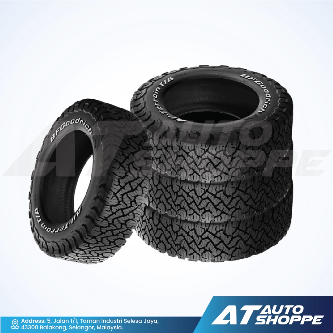 Stack of BFGoodrich tires with tread pattern on a white background, featuring AT Auto Shoppe branding.