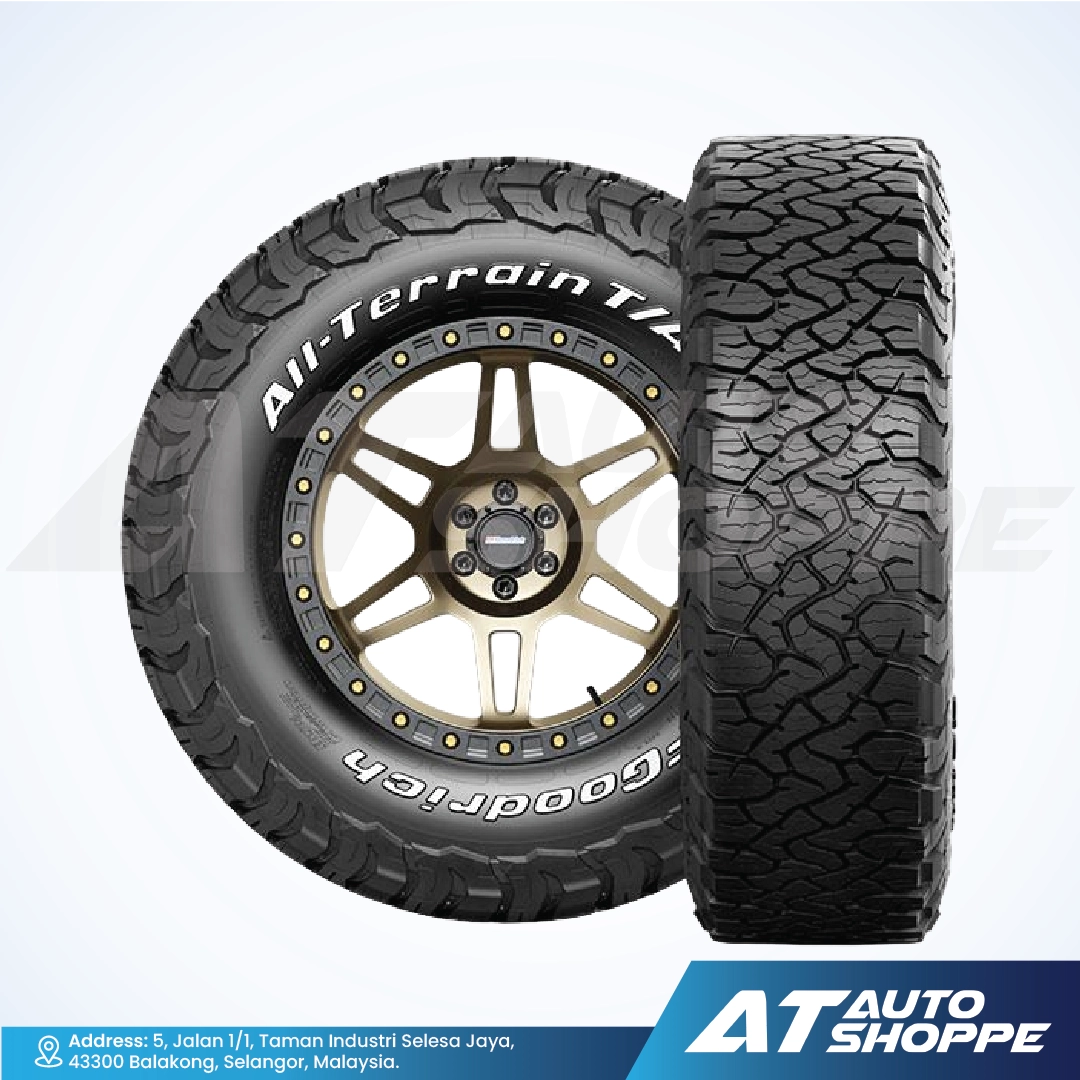 BFGoodrich All-Terrain T/A tires with a wheel on a white background, featuring the Goodyear logo and 'AT Auto Shoppe' branding.