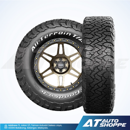 BFGoodrich All-Terrain T/A tires with a wheel on a white background, featuring the Goodyear logo and 'AT Auto Shoppe' branding.