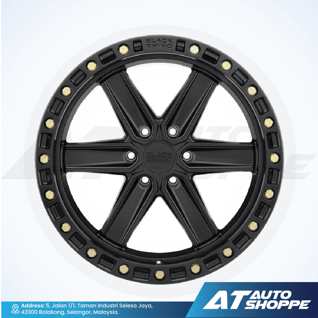 Black alloy wheel with gold accents on a white background, featuring the AT Auto Shoppe logo.