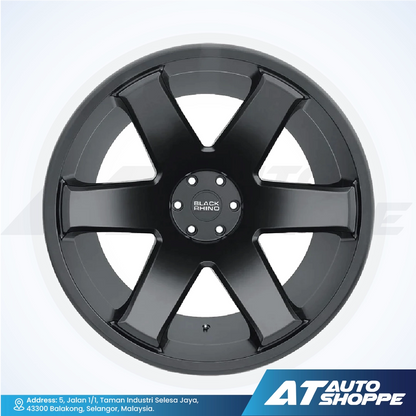 Black alloy wheel with 'Black Rhino' branding on a white background, featuring AT Auto Shoppe logo.