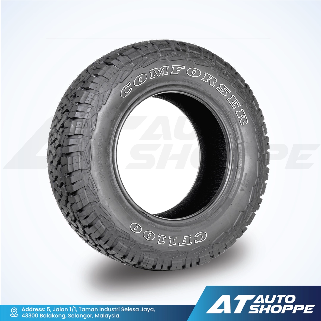 Comforser tire with tread pattern on a white background, featuring AT Auto Shoppe branding.