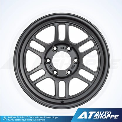 Black alloy wheel on a white background with AT Auto Shoppe branding.