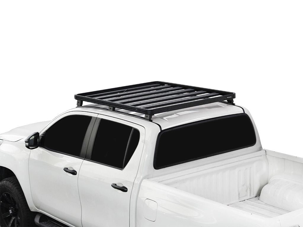 White truck with a black roof rack on a white background