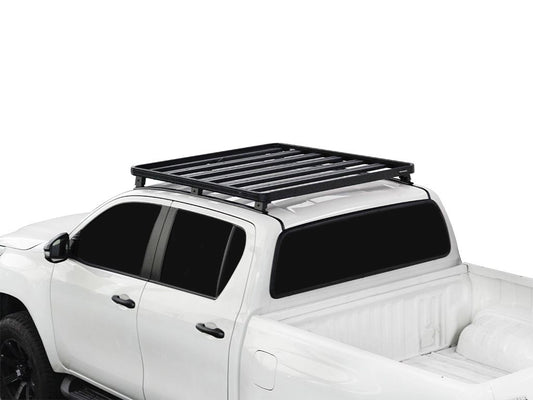 White truck with a black roof rack on a white background