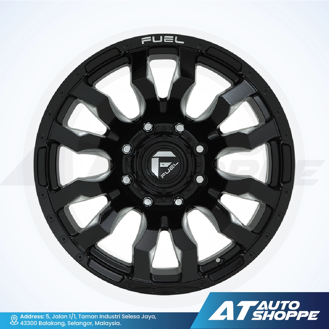 Black alloy wheel with 'Fuel' branding on a white background, featuring AT Auto Shoppe logo.