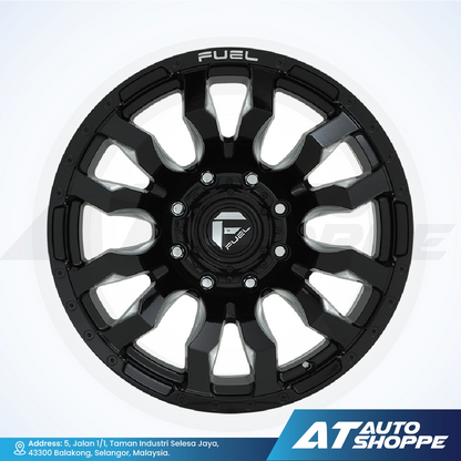 Black alloy wheel with 'Fuel' branding on a white background, featuring AT Auto Shoppe logo.