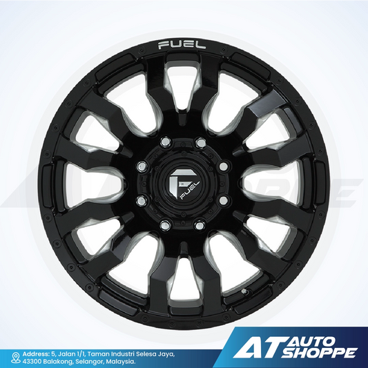 Black alloy wheel with 'Fuel' branding on a white background, featuring AT Auto Shoppe logo.