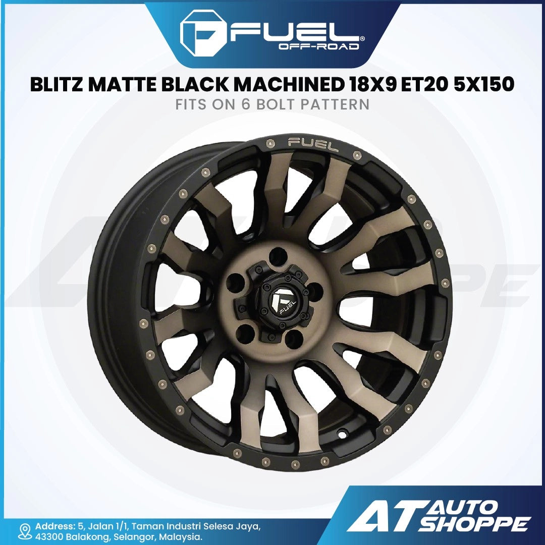 Fuel off-road wheel with black and gold finish on a white background