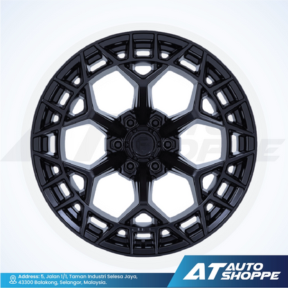Black alloy wheel rim on a white background with AT Auto Shoppe branding.