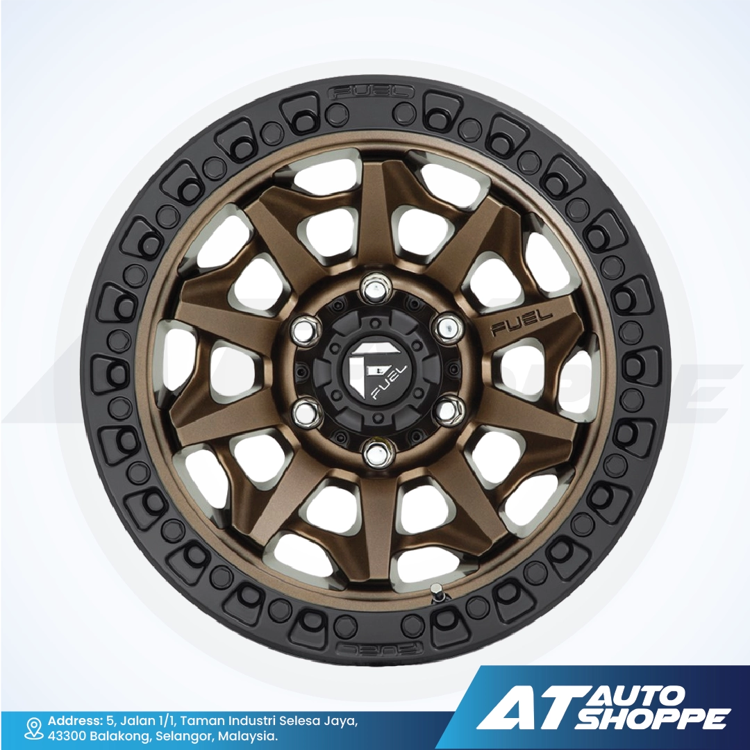 Brown and black wheel rim with 'Fuel' branding on a white background, featuring AT Auto Shoppe logo.