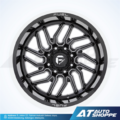 Black alloy wheel with 'Fuel' branding on a white background, featuring AT Auto Shoppe logo.