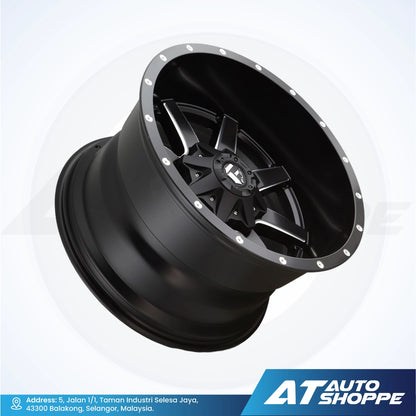 Black alloy wheel on a white background with AT Auto Shoppe branding.