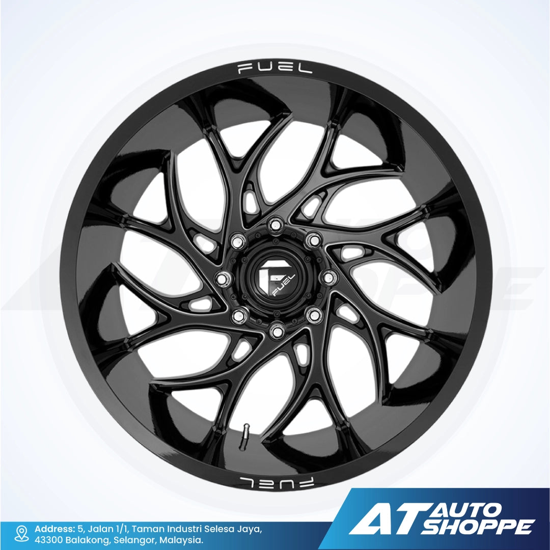 Black alloy wheel with 'Fuel' branding on a white background, featuring AT Auto Shoppe logo.