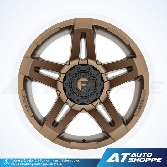 Bronze alloy wheel with a central hub on a white background, featuring the Fuel brand logo.