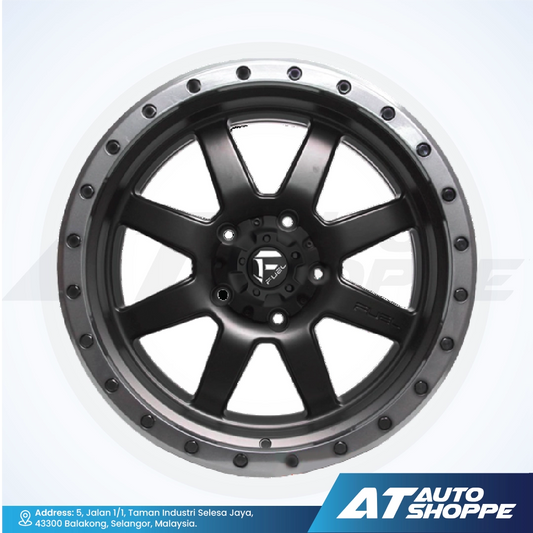 Car wheel rim with metallic finish on a white background, featuring AT Auto Shoppe branding.