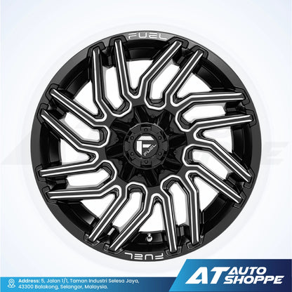 Black alloy wheel with 'Fuel' branding on a white background, featuring AT Auto Shoppe logo.