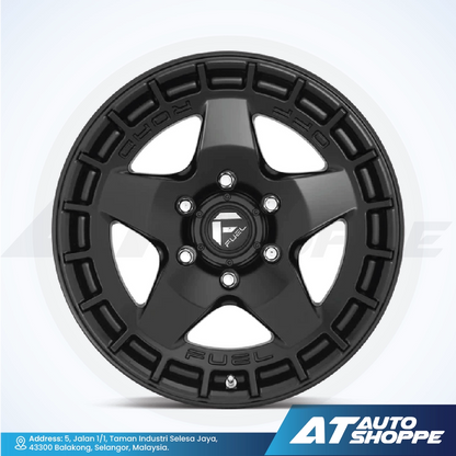 Black alloy wheel on a white background with AT Auto Shoppe branding.