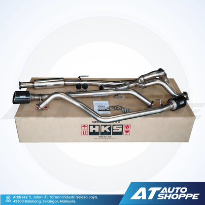 HKS car exhaust system in a cardboard box with HKS logo on a white background