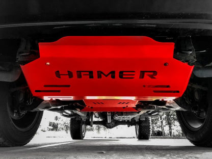 Red undercarriage guard with 'HAMER' branding on a vehicle