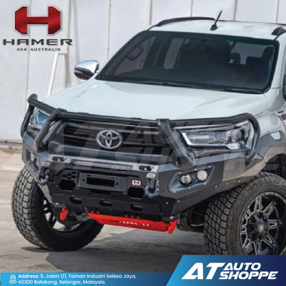 White Toyota truck with a black front bumper and 'Hamer 4x4 Australia' branding.