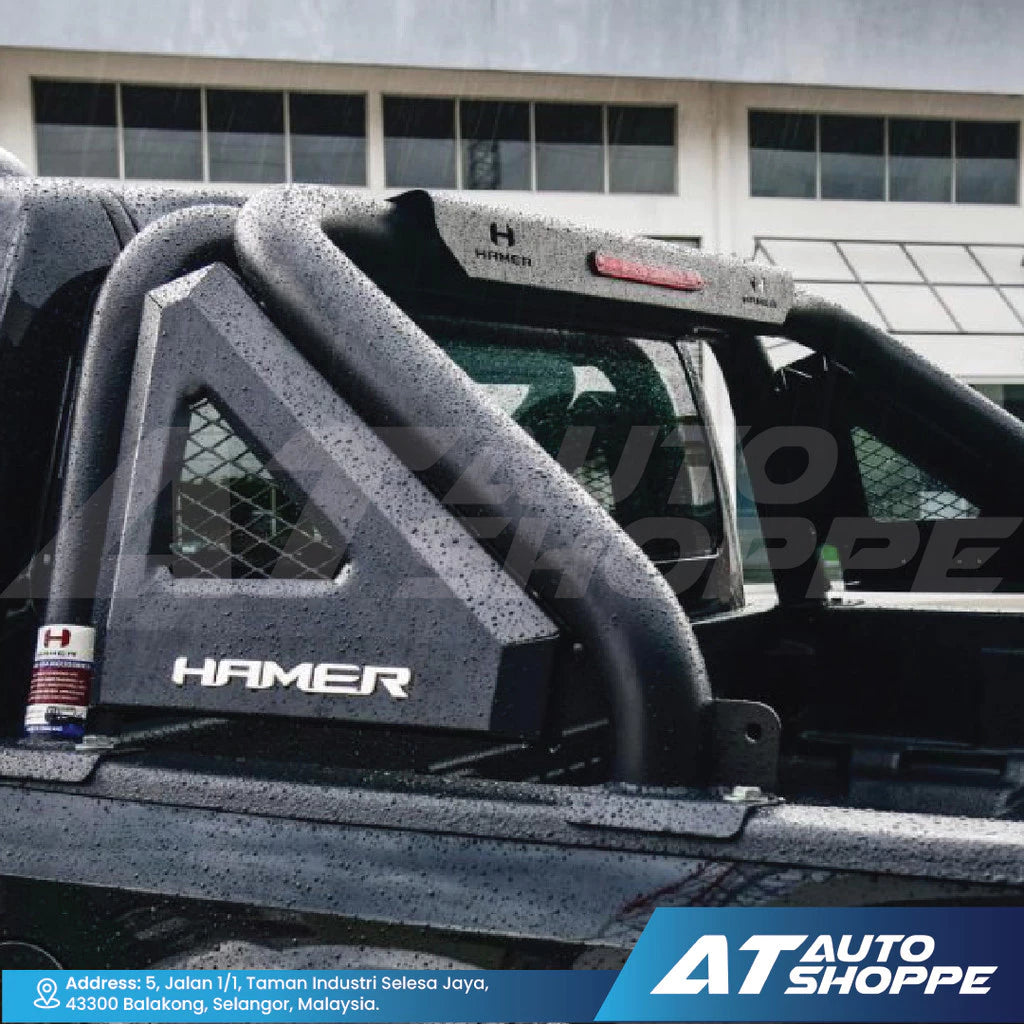 Hamer car rack on a vehicle with AT Auto Shoppe branding.