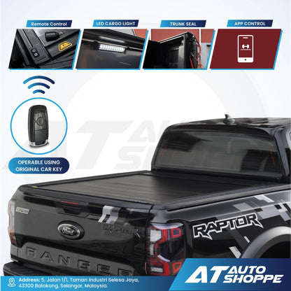 Ford Raptor truck bed cover with features and AT Auto Shoppe branding.