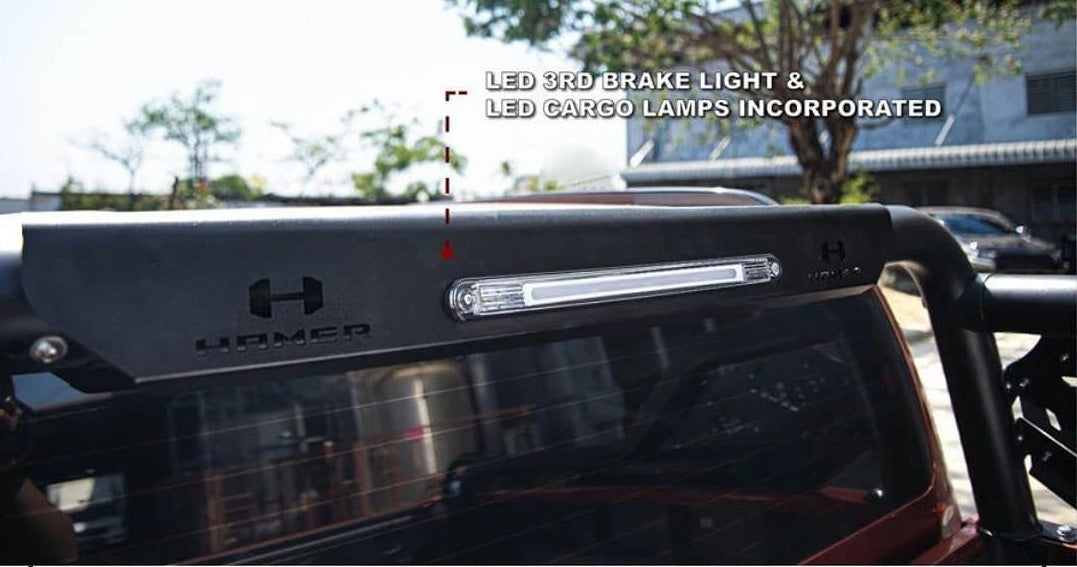 LED third brake light and cargo lamps on a vehicle with 'Hamer 4x4' branding.