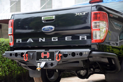 Back view of a black Ford Ranger truck with a HAMER bumper.