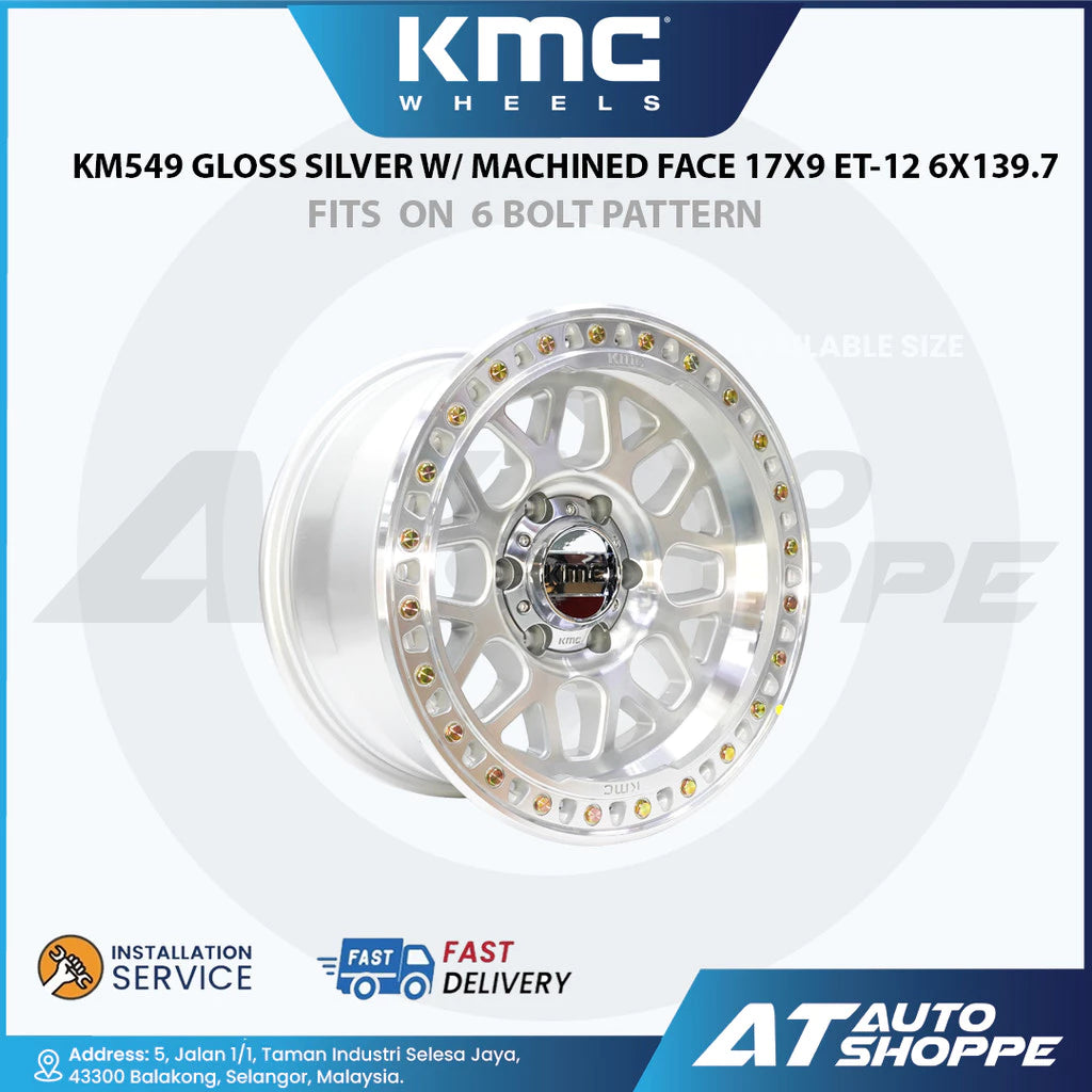 KMC wheels rim with AT Auto Shoppe branding on a white background