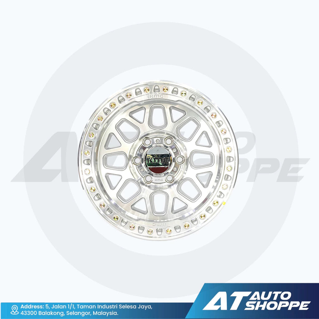 Car wheel rim with a white background and AT Auto Shoppe branding.