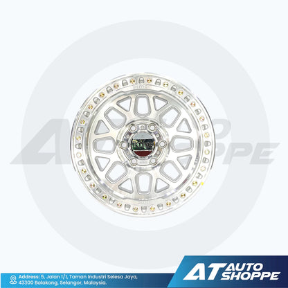 Car wheel rim with a white background and AT Auto Shoppe branding.