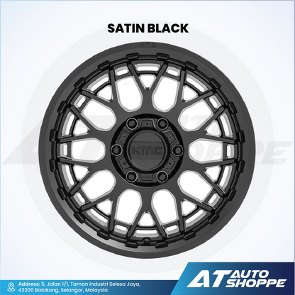 Satin black wheel rim on a white background with AT Auto Shoppe branding.