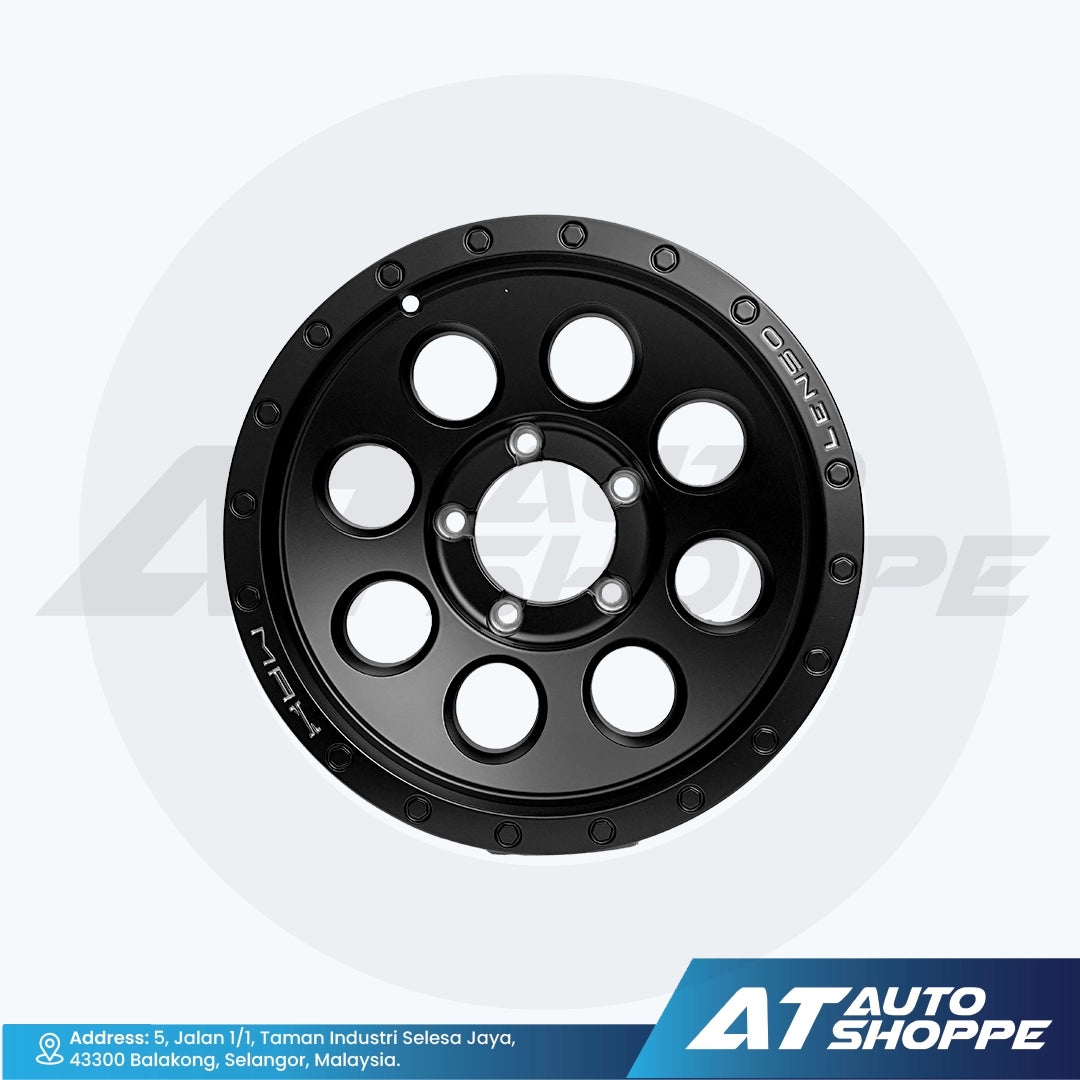 Black alloy wheel on a white background with AT Auto Shoppe branding.